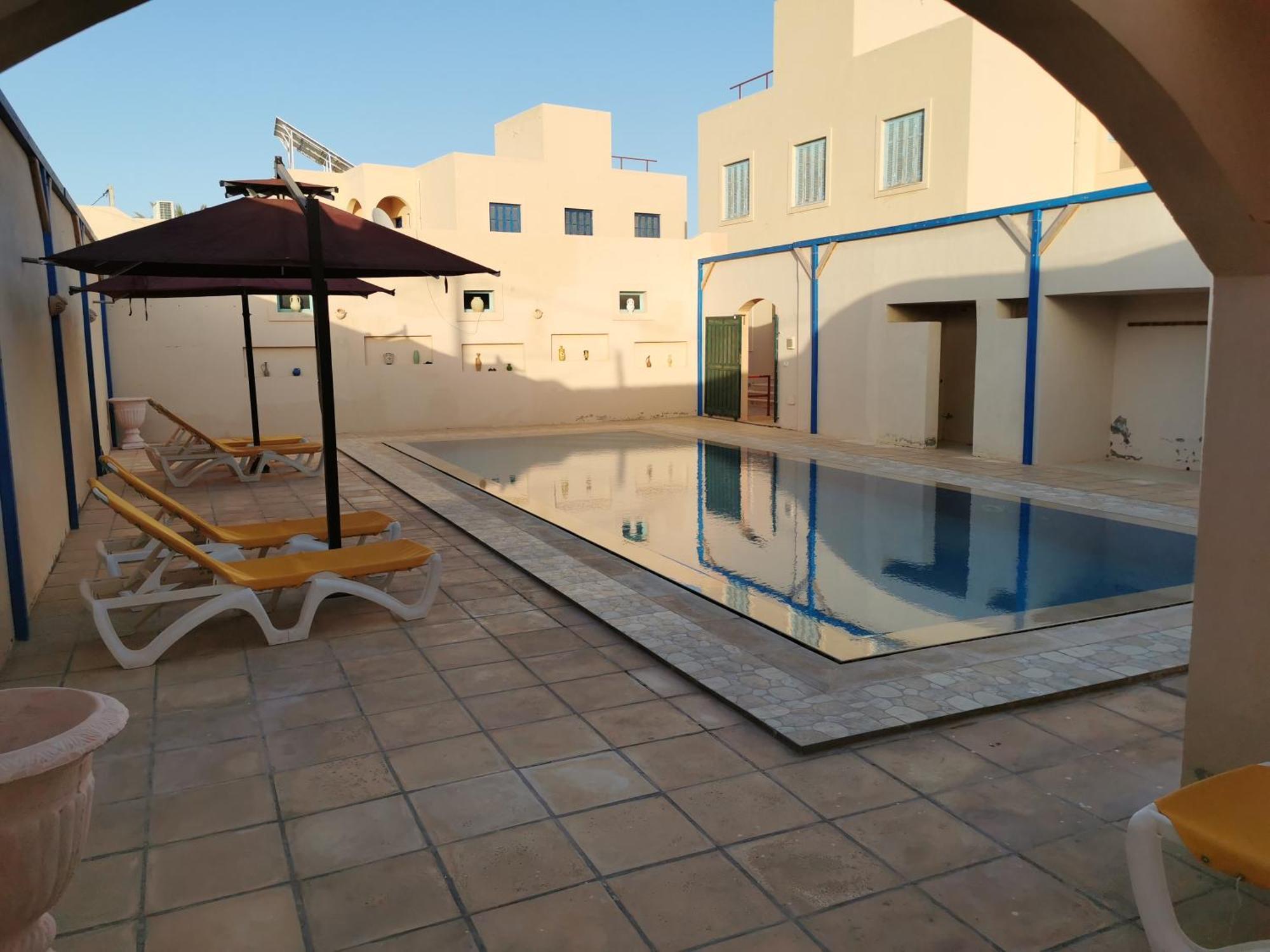 Dar El Bey Apartment Ajim Bagian luar foto