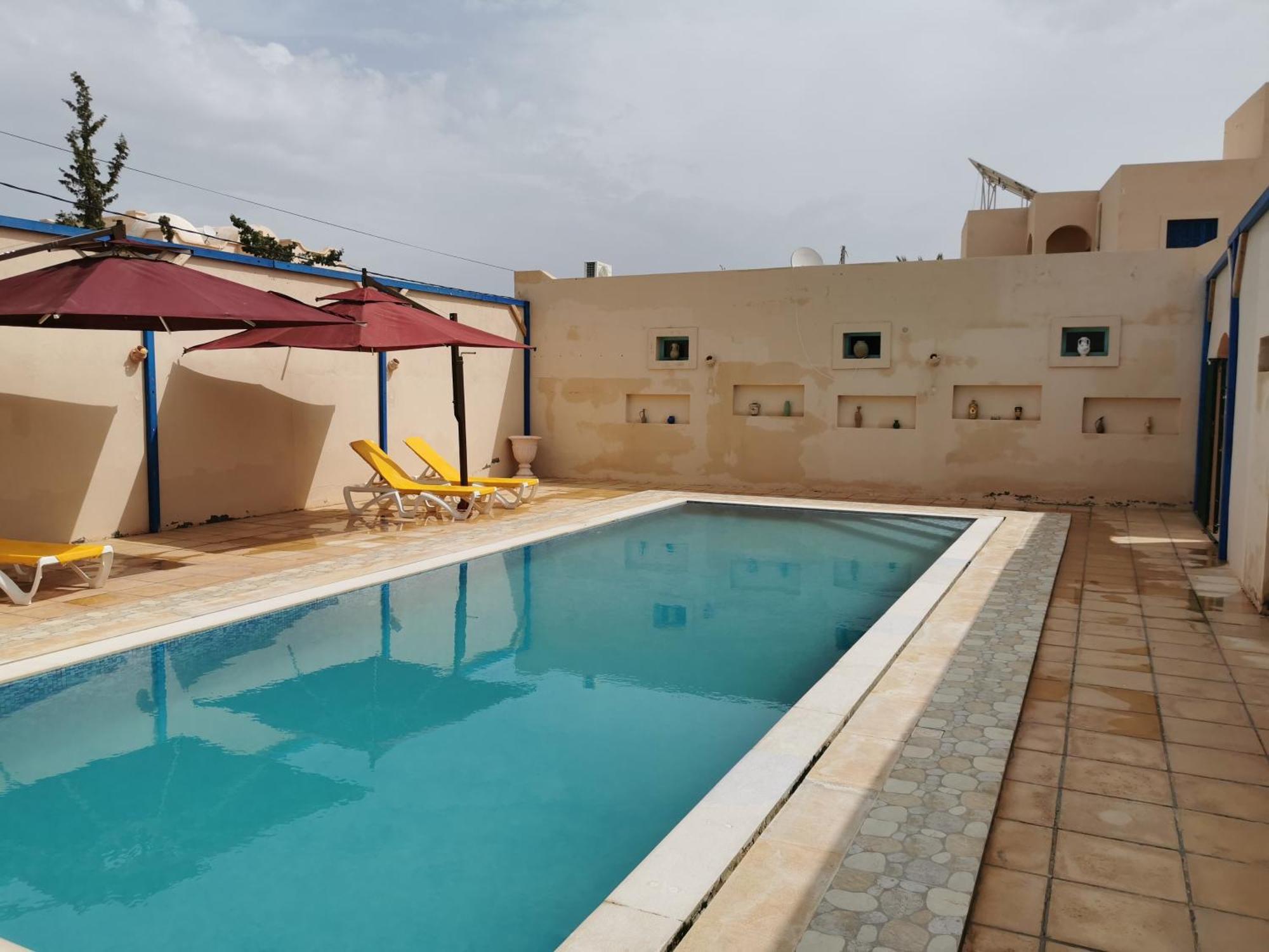 Dar El Bey Apartment Ajim Bagian luar foto
