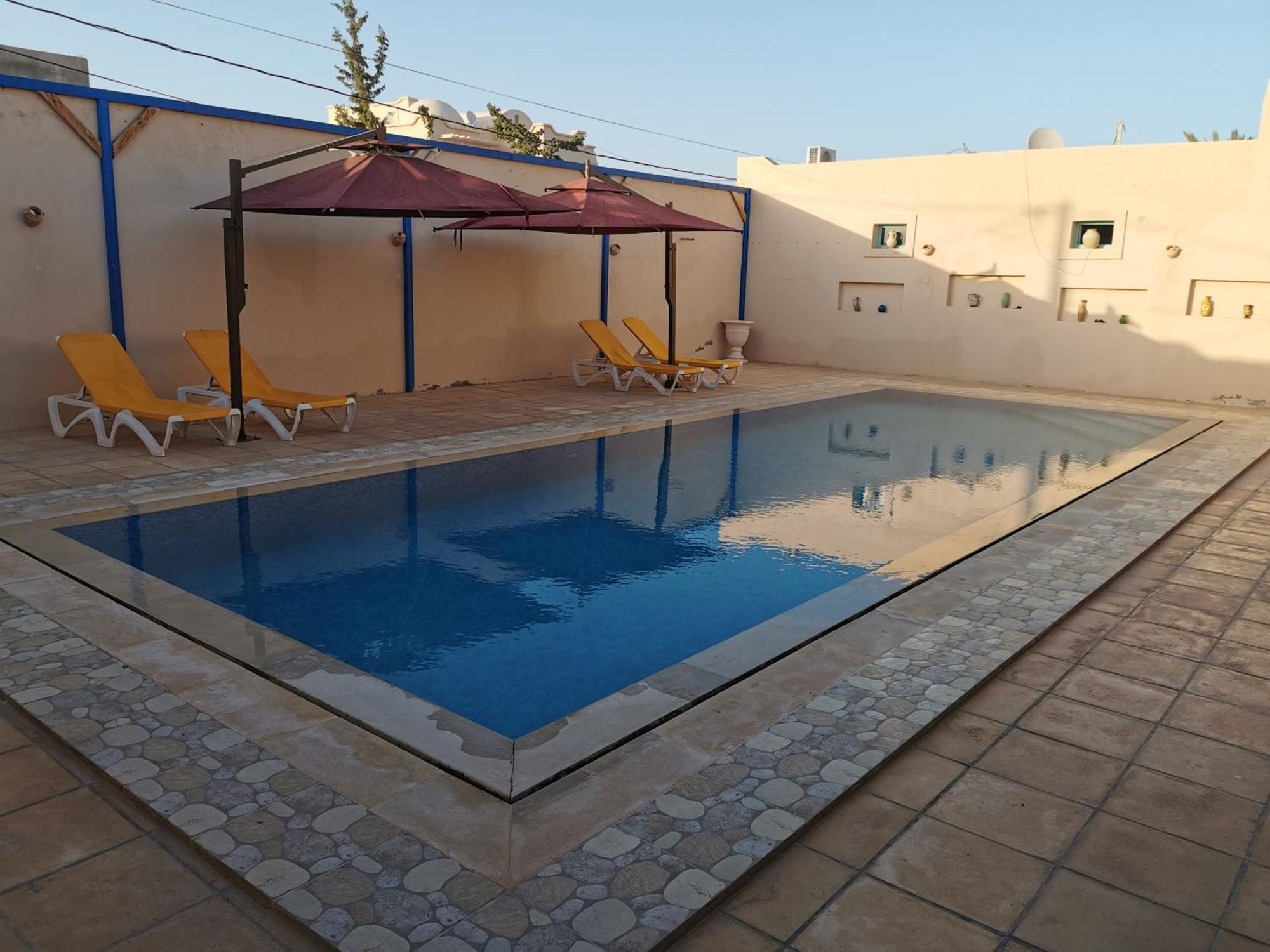 Dar El Bey Apartment Ajim Bagian luar foto